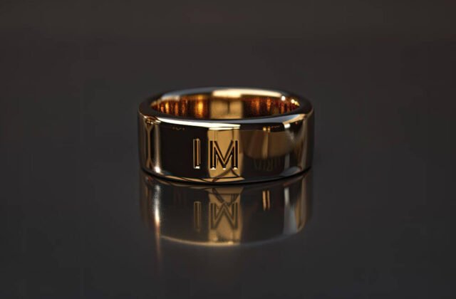 Gold wedding ring engraved with IM, symbolizing marriage, identity, and loss after divorce
