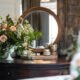 Round mirror entryway table with fall decor — reflecting hidden grief symptoms no one talks about